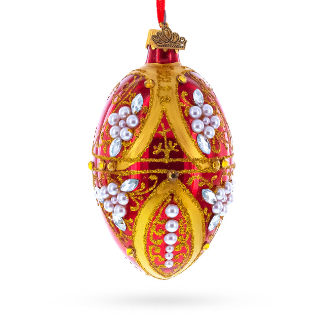 Regal Red and Gold Filigree with Pearls Glass Egg Ornament 4 Inches in Red color Oval
