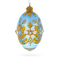 Blue and Gold Embossed Floral Glass Egg Ornament 4 Inches in Blue color Oval