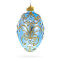 Elegant Blue and Gold Jeweled Glass Egg Ornament 4 Inches in Blue color Oval
