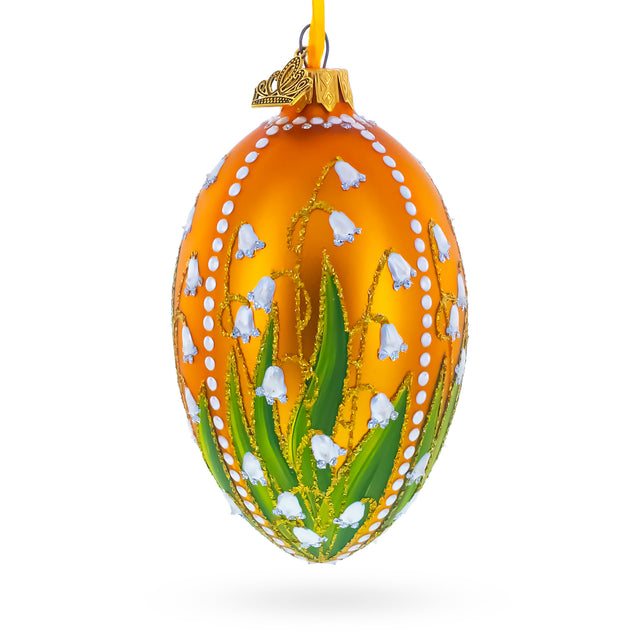 Lily of the Valley on Gold Egg Glass Ornament in Gold color Oval