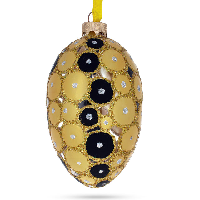 Gold and Black Circles Glass Egg Christmas Ornament 4 Inches in Gold color, Oval shape
