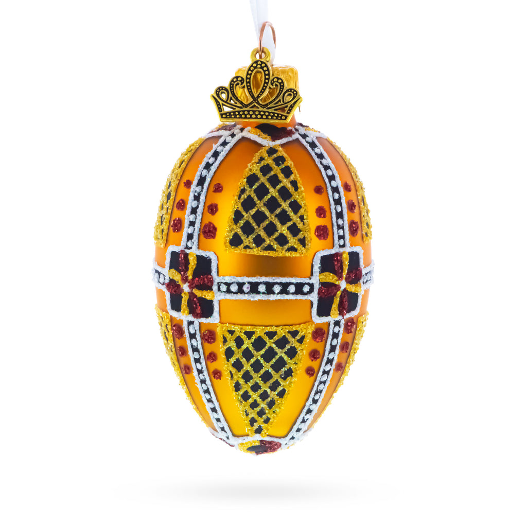 Amber with Red, Black, and Gold Geometric Pattern Mini Glass Egg Ornament 2.9 Inches in Gold color Oval