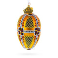 Amber with Red, Black, and Gold Geometric Pattern Mini Glass Egg Ornament 2.9 Inches in Gold color Oval