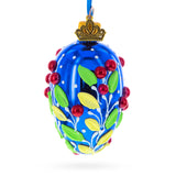 Shiny Blue with Red Berry and Green Leaf Accents Mini Glass Egg Ornament 2.9 Inches in Blue color Oval