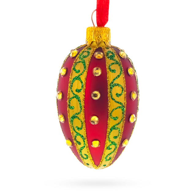 Red and Gold with Green Swirls and Jewel Accents Mini Glass Egg Ornament 2.9 Inches in Red color Oval
