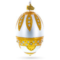 Golden Leaves On White Egg Glass Ornament 4 Inches in Gold color Oval