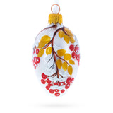 Frosted White with Red Berry and Snow-Covered Branch Design Mini Glass Egg Ornament 2.9 Inches in White color Oval