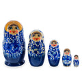 White Hood with Blue Flowers Wooden Nesting Dolls in  color