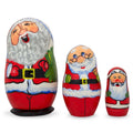 Set of 3 Smiling Santa Figurines Wooden Nesting Dolls 4.25 Inches in Multi color