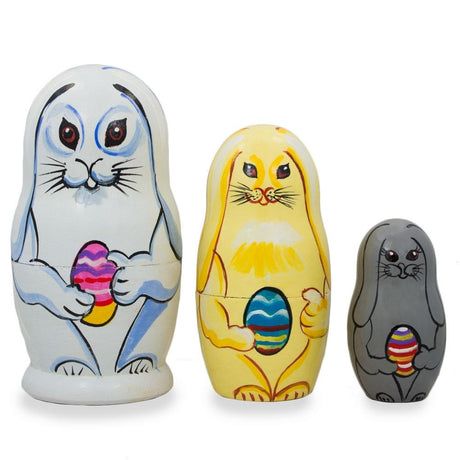 Set of 3 Bunnies with Easter Eggs Wooden Nesting Dolls 4.25 Inches in Multi color,  shape