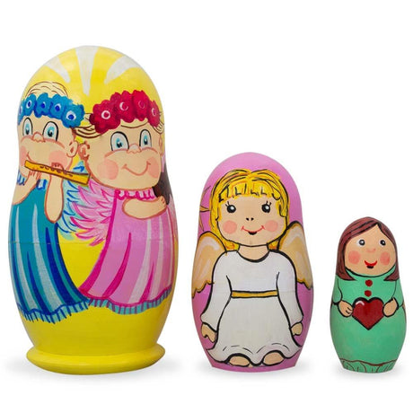 Wood Set of 3 Guardian Angels with Flute, Heart Wooden Nesting Dolls 4.25 Inches in Multi color
