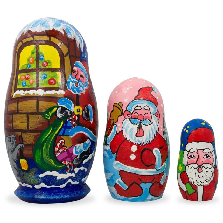 Set of 3 Santa's Delivering Gifts Wooden Nesting Dolls 4.25 Inches in Multi color