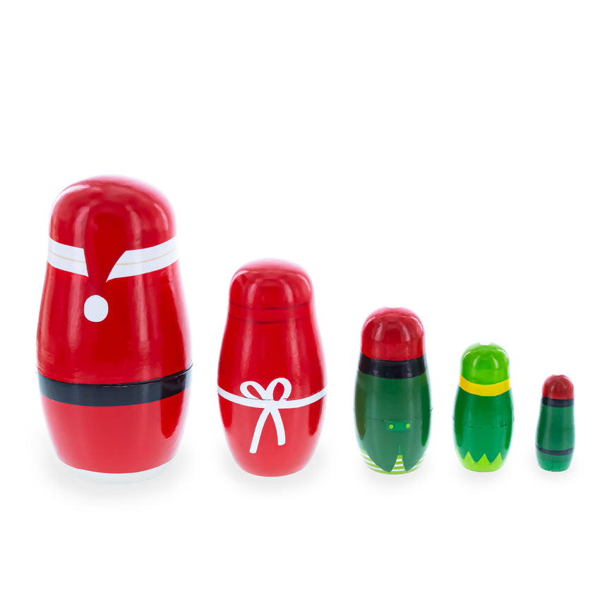 Shop Set of 5 Santa, Mrs. Claus, Elf & Snowman Wooden Nesting Dolls 4.75 Inches. Buy Nesting Dolls Santa    for Sale by Online Gift Shop BestPysanky stackable matryoshka stacking toy babushka Russian authentic for kids little Christmas nested matreshka wood hand painted collectible figurine figure statuette