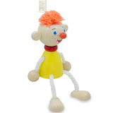 Jumping Boy Wooden Doll on a Spring 4 Inches in Yellow color