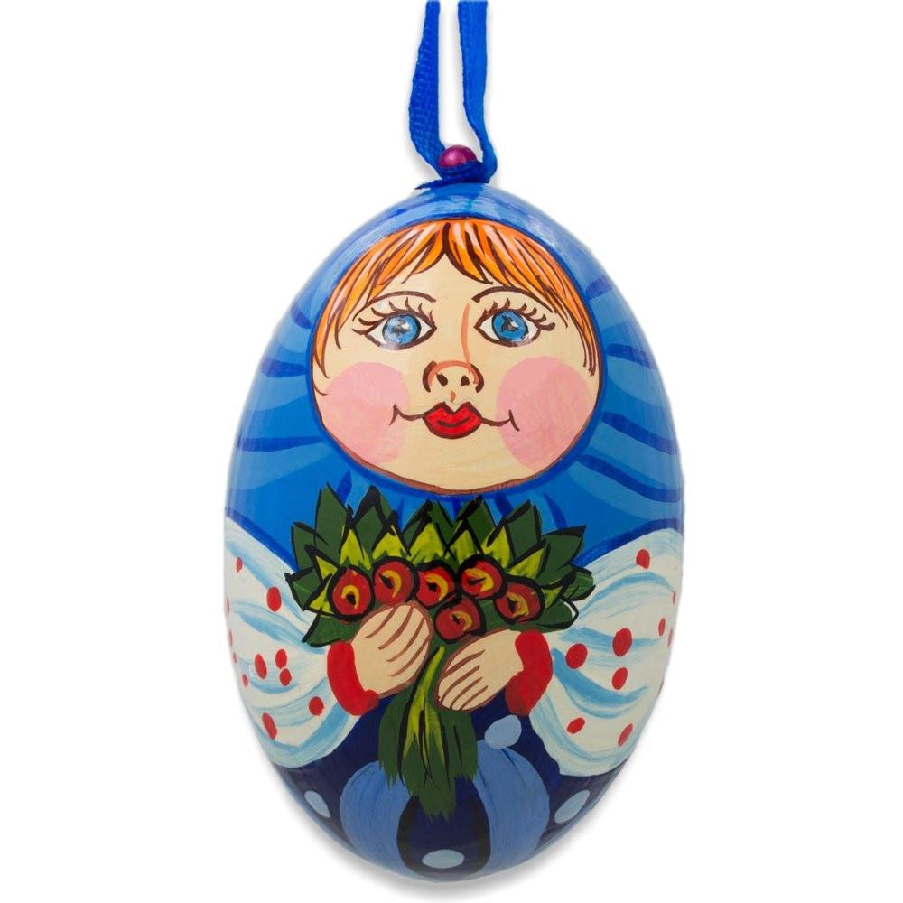 Doll with Flower Bouquet Wooden Egg Ornament 3 Inches in Blue color, Oval shape