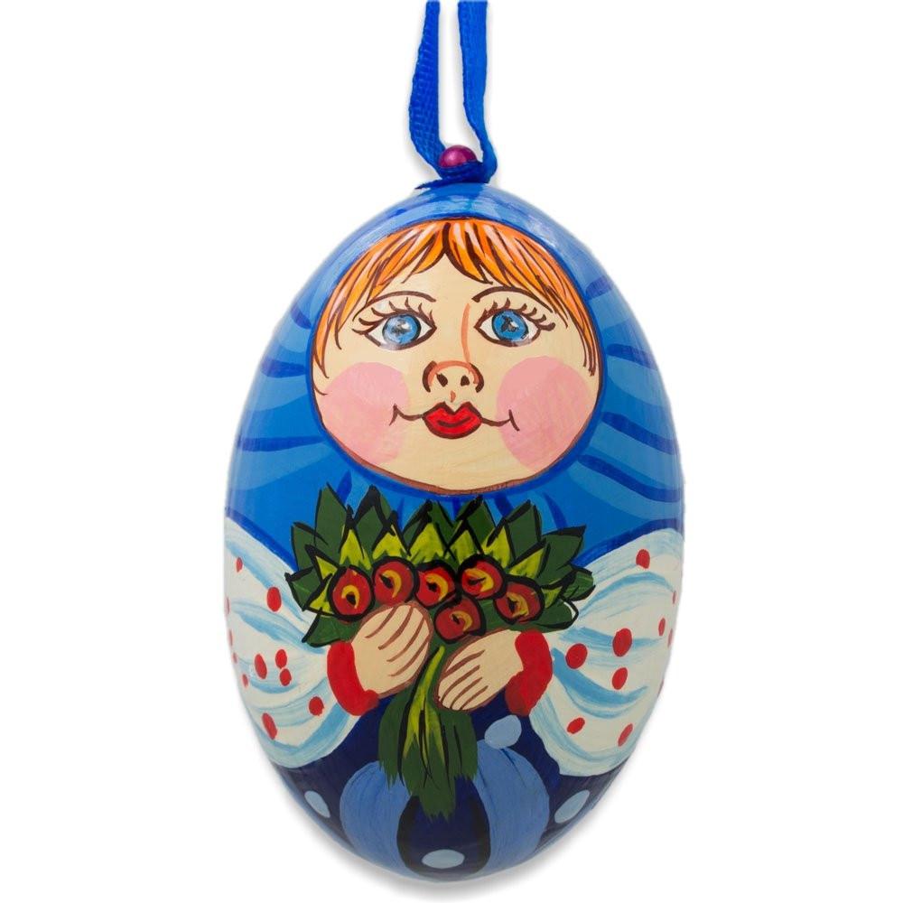 Doll with Flower Bouquet Wooden Egg Ornament 3 Inches in Blue color Oval