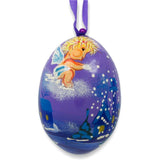 Angel Making it Snow at Night Wooden Christmas Ornament 3 Inches in Blue color Oval