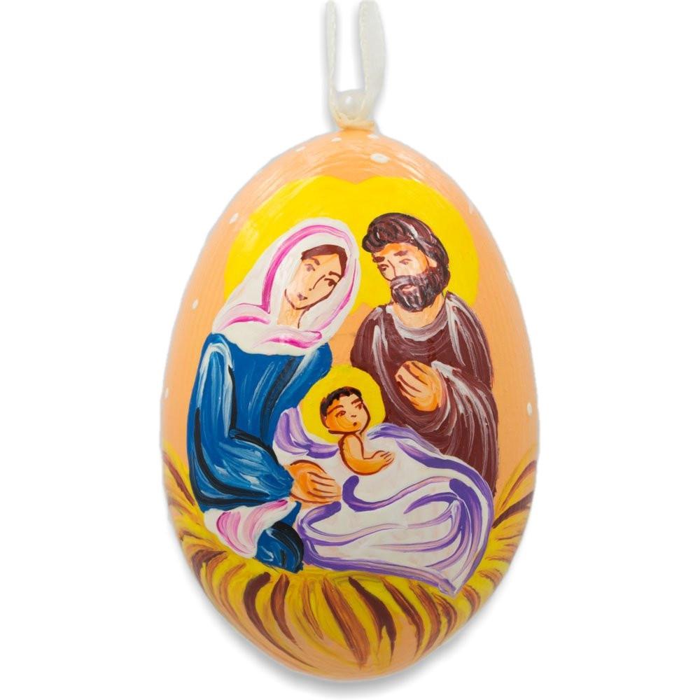 Mary and Joseph Admiring Jesus Wooden Christmas Ornament 3 Inches in Multi color, Oval shape