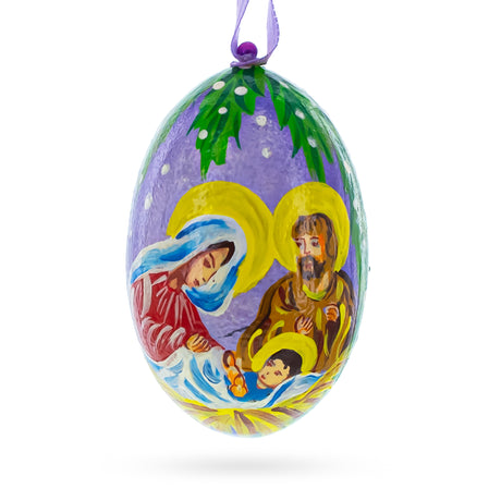 Wood Mary and Joseph Overlooking Jesus Wooden Christmas Ornament 3 Inches in Multi color Oval