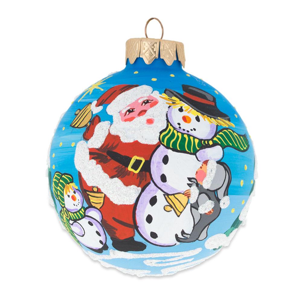 Festive Santa and Two Snowmen Blown Glass Ball Christmas Ornament 3.25 Inches in Multi color, Round shape