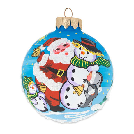 Festive Santa and Two Snowmen Blown Glass Ball Christmas Ornament 3.25 Inches in Multi color, Round shape