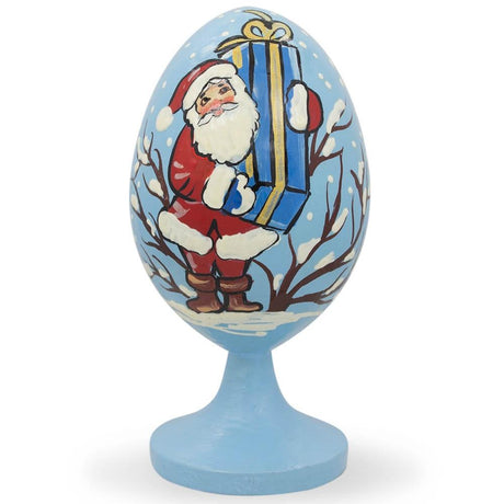 Santa with Large Gift in the Forest Wooden Figurine in Multi color, Oval shape