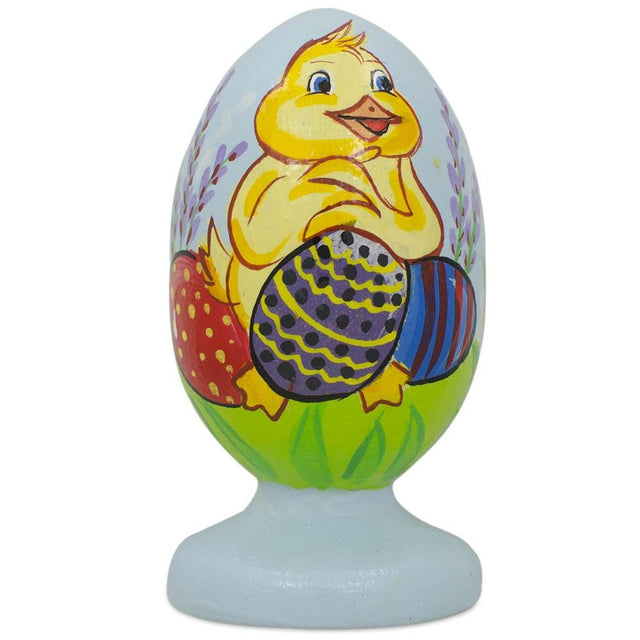 Wood Duck Holding Easter Egg Wooden Figurine in Multi color Oval