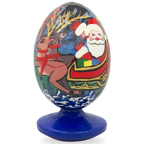 Santa Claus, Reindeer in Winter Village Wooden Figurine in Multi color, Oval shape