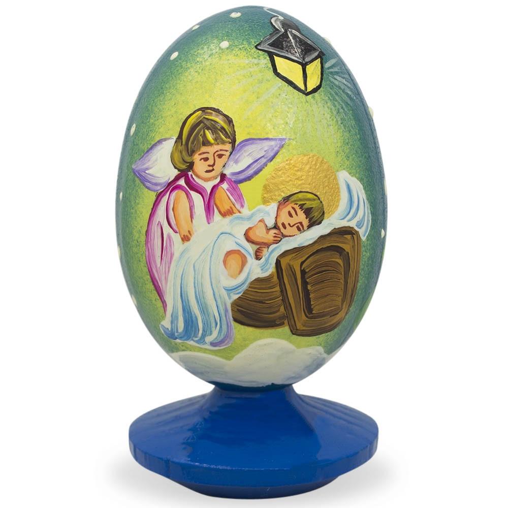 Guardian Angel Overlooking Sleeping Baby Jesus Wooden Figurine in Multi color Oval