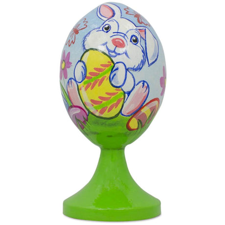 White Bunny Holding Easter Egg Wooden Figurine in Multi color Oval