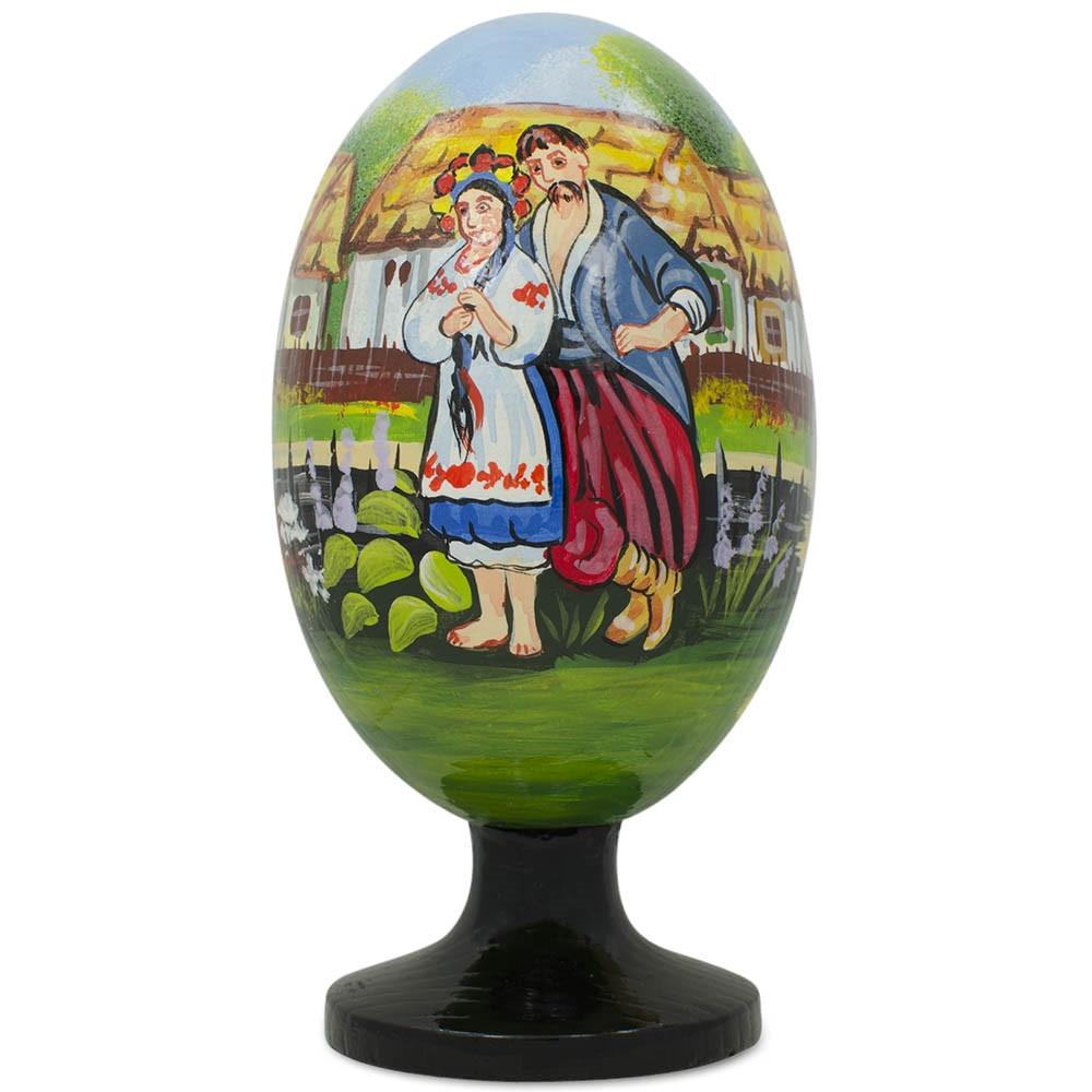 Ukrainian Couple in the Village Wooden Easter Egg Figurine 4.75 Inches in Multi color Oval