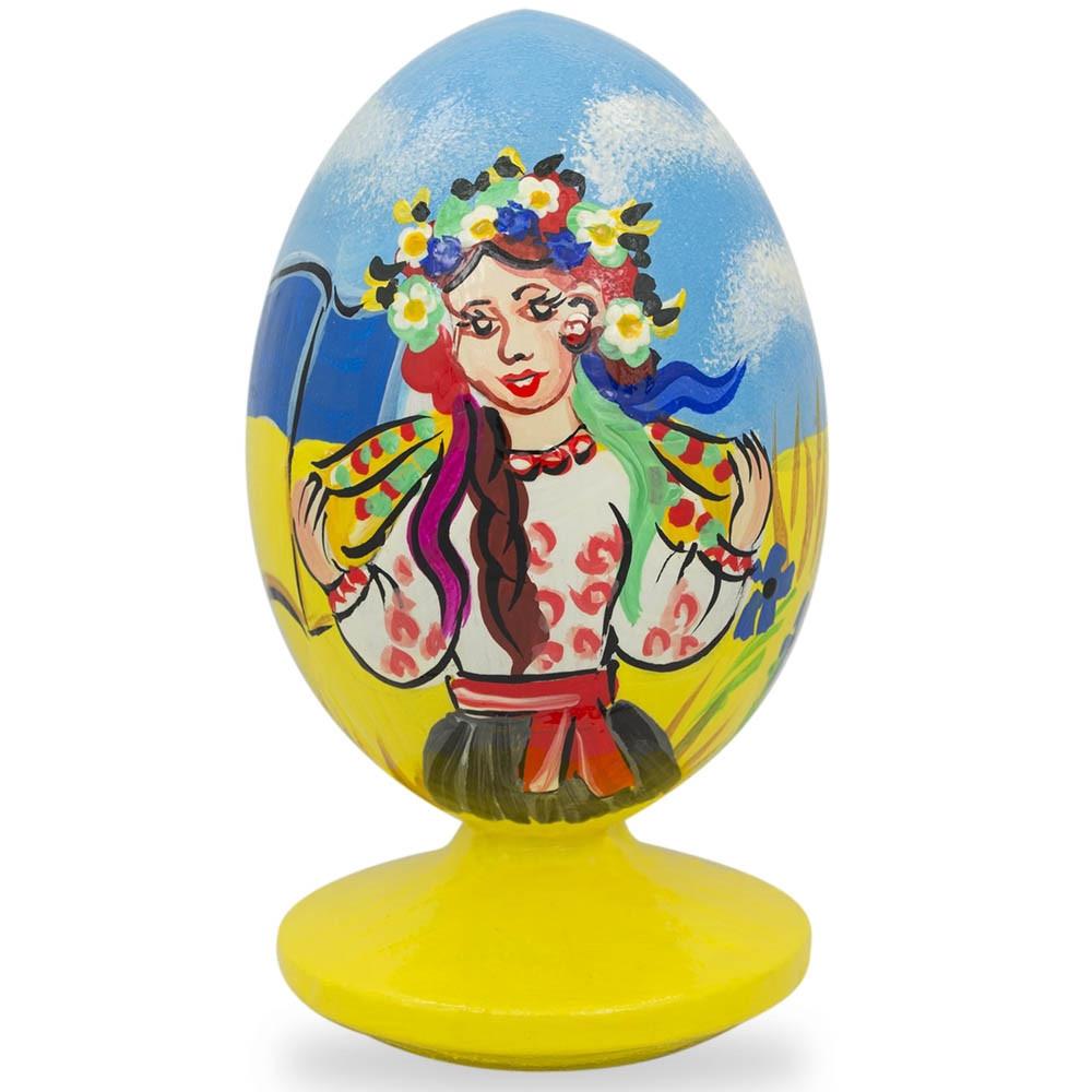 Ukrainian Girl with Flag Easter Egg Figurine in Multi color, Oval shape