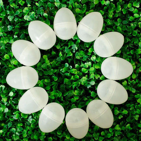 12 White Plastic Easter EggsUkraine , dimensions in inches: 2.25 x 1.65 x 1.65