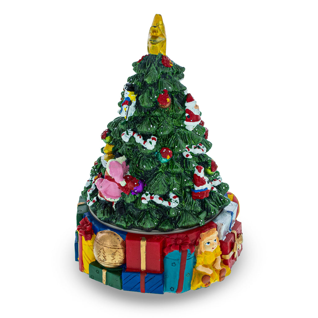 Spinning Base Musical Figurine with Children Decorating Christmas TreeChina , dimensions in inches: 6.2 x 4.1 x 4.1