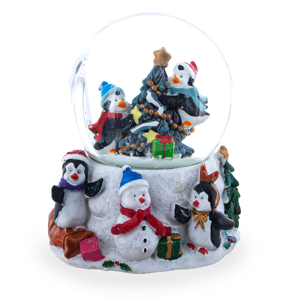 Penguins' Festive Tree Celebration Snow Water Globe in White color Round