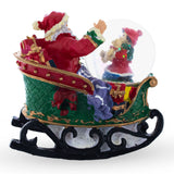 Santa's Joyful Sleigh Ride Mini Snow Water Globe , dimensions in inches: 4 x 3.5 x 1.77