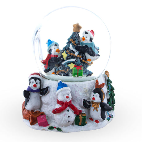 Penguins' Festive Tree Celebration: Miniature Snow Water Globe in White color, Round shape