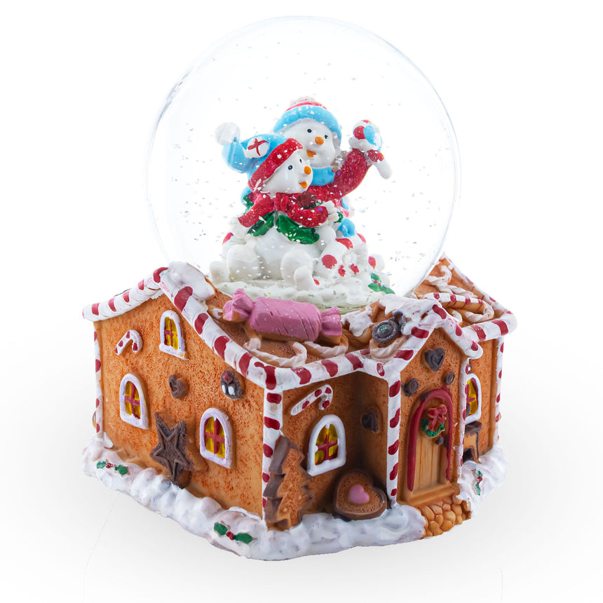 Gingerbread Cottage Snowmen Romance Musical Water Snow Globe , dimensions in inches: 5.9 x 4.45 x 4