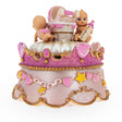 Joyful Baby Stroller Spin: Spinning Musical Figurine with Crawling Babies in Pink color,  shape