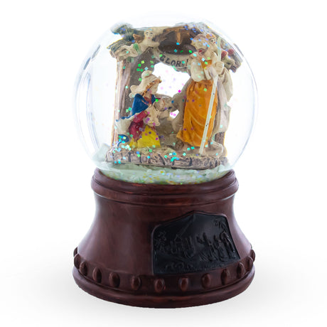 Divine Nativity Harmony: Musical Water Snow Globe with Holy Family and Angels in Multi color, Round shape