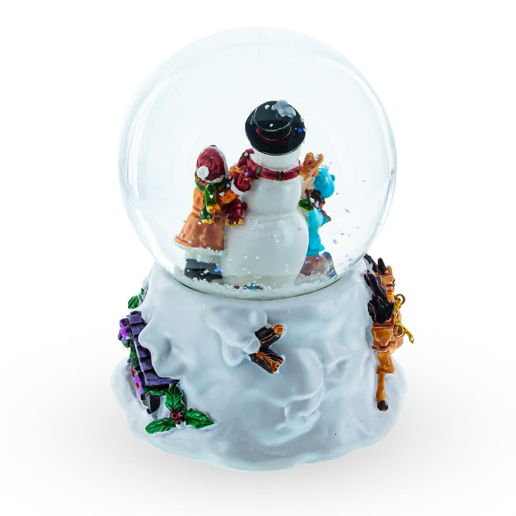 Snowman Embrace Musical Water Snow GlobeChina , dimensions in inches: 4.8 x 3.5 x 3.5