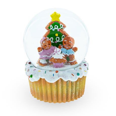 Sweet Gingerbread Harmony: Musical Christmas Water Globe with Gingerbread Family and Cupcake in Multi color,  shape