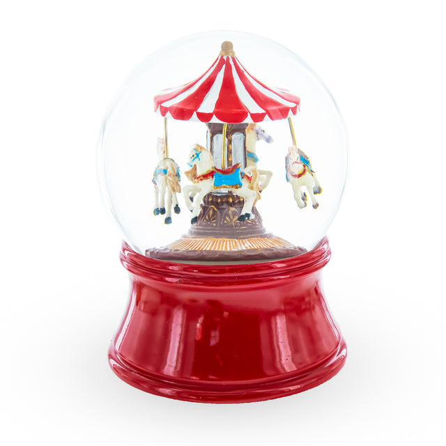 Whirling Carousel: Wind-up Spinning Horses Musical Water Globe in Red color, Round shape