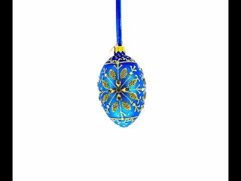 Goldene Schneeflocke auf blauem Glasei, 10 cm