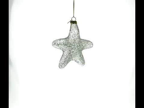 Adorno navideño de vidrio soplado con la palabra Love en forma de estrella blanca radiante