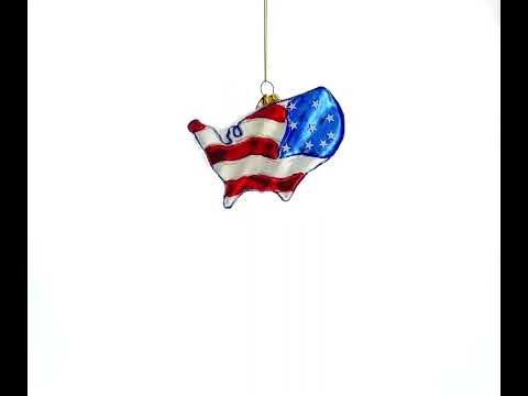 Adorno navideño de cristal con la bandera de Estados Unidos en el mapa