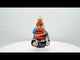 Santa Driving a Blue Car Glass Christmas Ornament