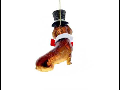 Weihnachtsschmuck aus Glas, der einen Basset Hound zeigt