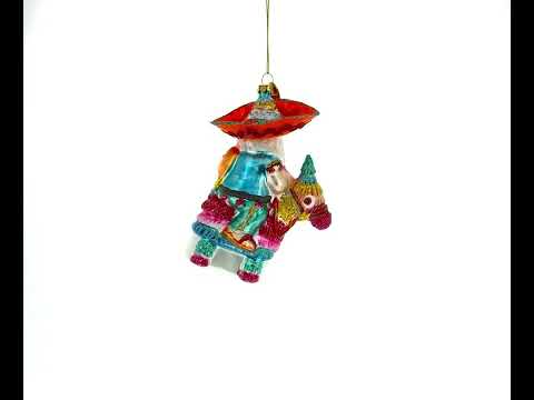 Santa Riding a Festive Pinata Glass Christmas Ornament