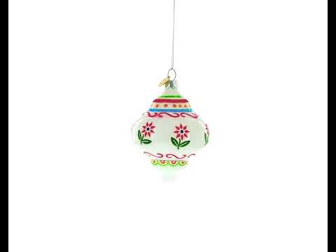 Weißer Weihnachtsschmuck aus Glas mit rotem Blumenmuster